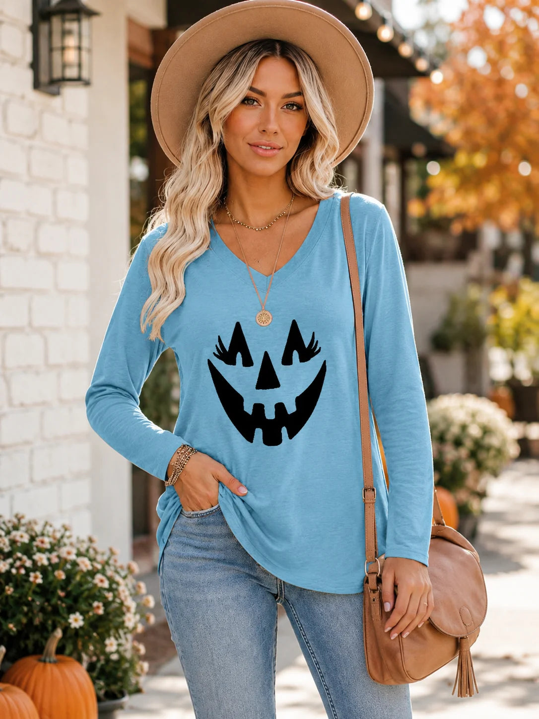 Halloween Pumpkin Graphic Long Sleeve Shirts for Women V Neck Cute Eyelash Pumpkin Face Tee Casual Loose Fall Holiday Outfit Tops